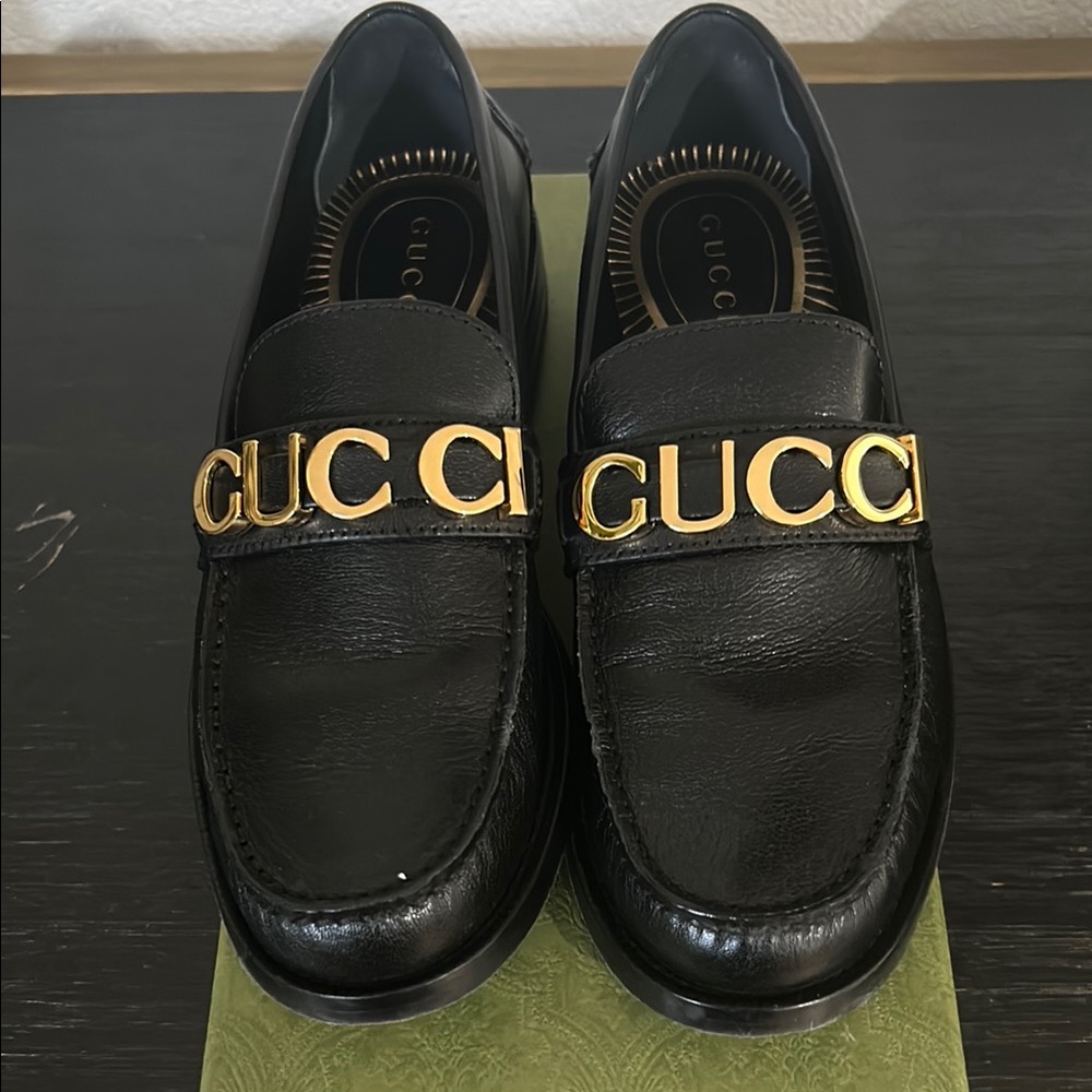 Gucci Black Leather Loafers with Gold Logo